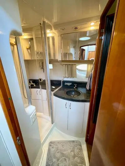 "kimberly Cay" Yacht Photos Pics 2003 Carver 360 Sport Sedan bathroom with modern fixtures, shower, and vanity.