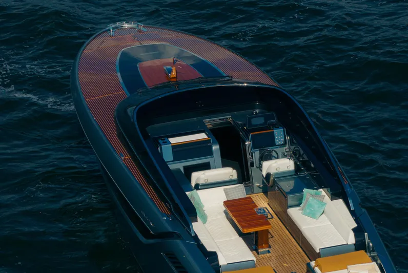  Yacht Photos Pics 2022 Riva Dolceriva luxury yacht with elegant deck and seating on the water.