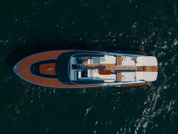  Yacht Photos Pics Aerial view of 2022 Riva Dolceriva yacht on open water.