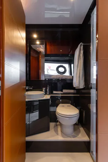  Yacht Photos Pics Luxurious 2022 Riva Dolceriva yacht bathroom with modern fixtures and elegant design.