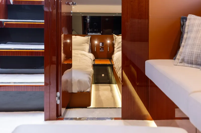  Yacht Photos Pics Interior of 2022 Riva Dolceriva yacht, featuring luxurious cabin and seating area.