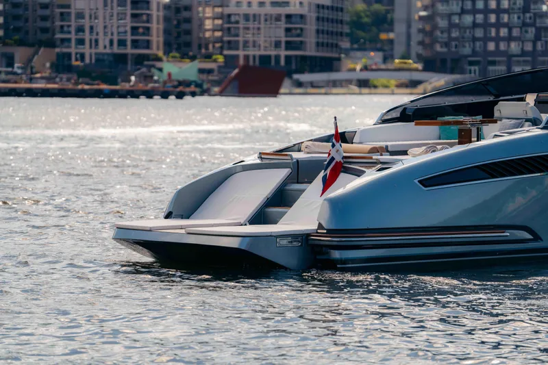  Yacht Photos Pics 2022 Riva Dolceriva yacht on water, cityscape background, elegant design.