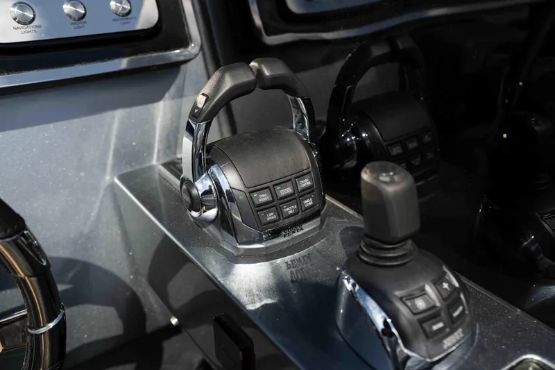  Yacht Photos Pics Control panel of a 2022 Riva Dolceriva yacht, featuring modern throttle and joystick controls.