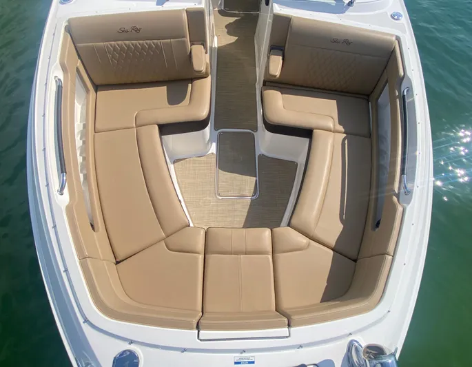 Casa - 2022 Sr 310 Slx @ Cancun Yacht Photos Pics Luxurious seating on 2022 Sea Ray SLX 310 boat, featuring tan upholstery and spacious layout.