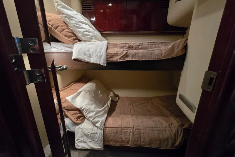 Verdee Yacht Photos Pics Bunk beds in 2007 Sea Ray 52 Sedan Bridge yacht cabin, cozy and well-appointed.