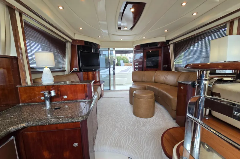 Verdee Yacht Photos Pics Luxurious interior of a 2007 Sea Ray 52 Sedan Bridge yacht with elegant furnishings.