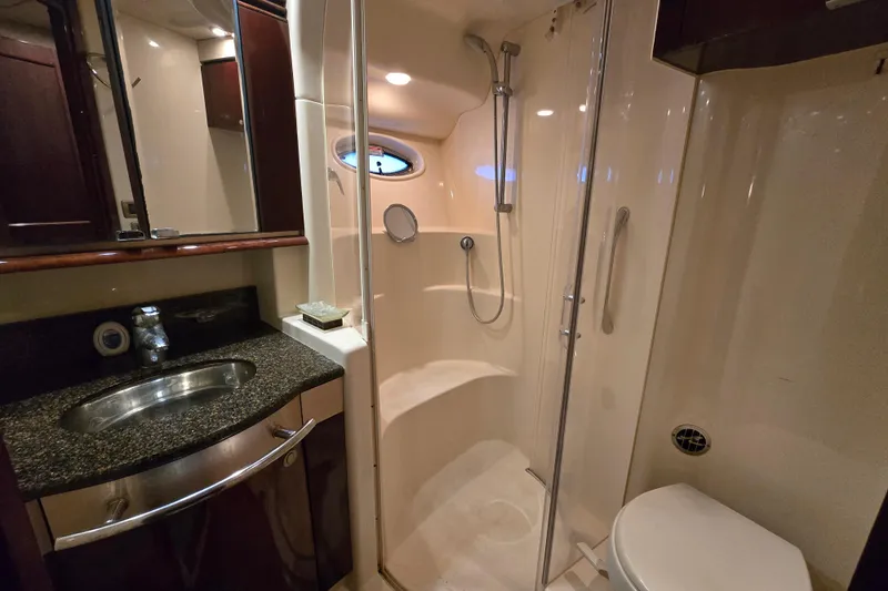 Verdee Yacht Photos Pics Luxurious bathroom in 2007 Sea Ray 52 Sedan Bridge yacht with shower and sink.