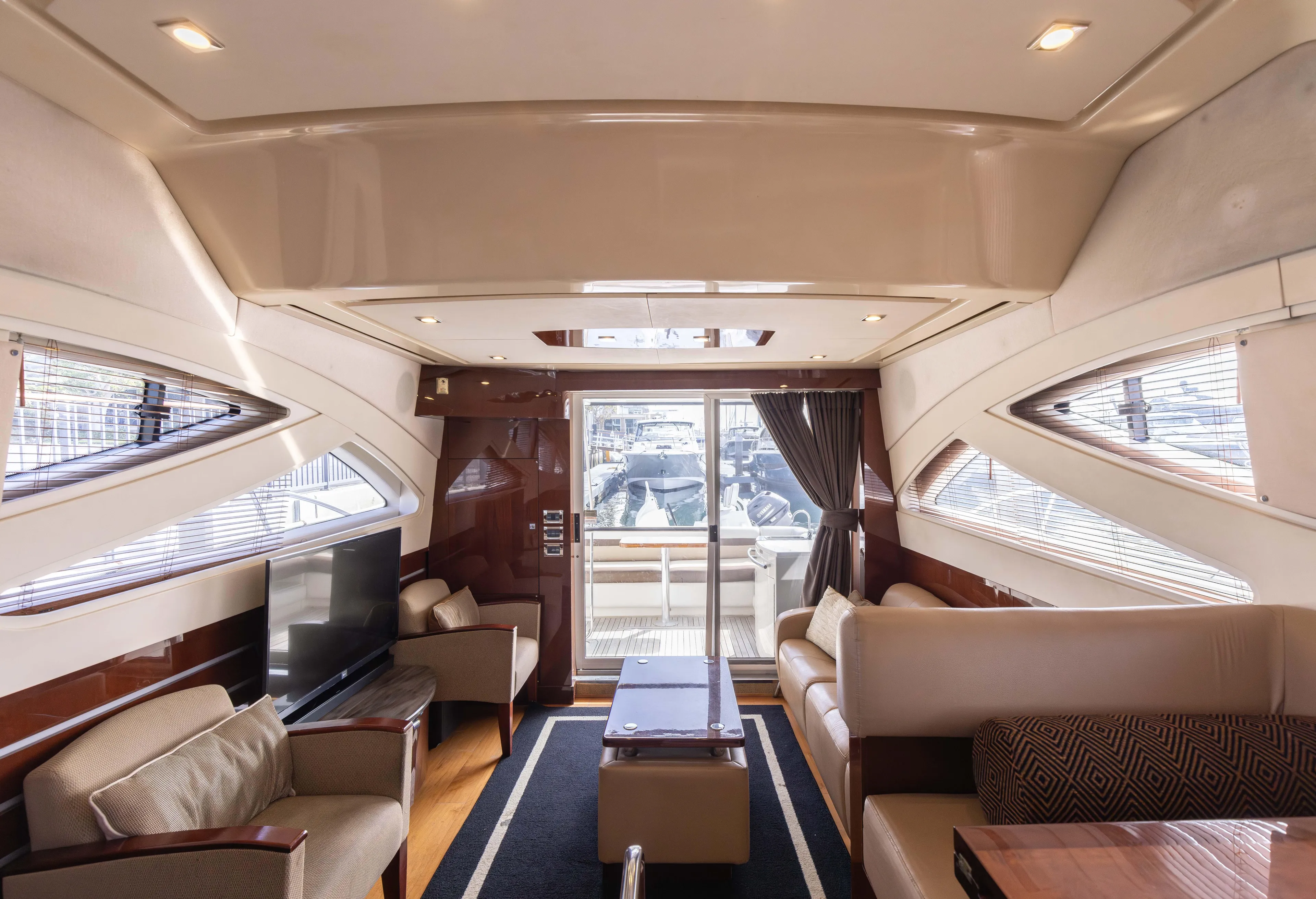 Ka-bar Yacht Photos Pics Luxurious interior of 2012 Sea Ray 450 Sedan yacht with elegant seating and modern design.