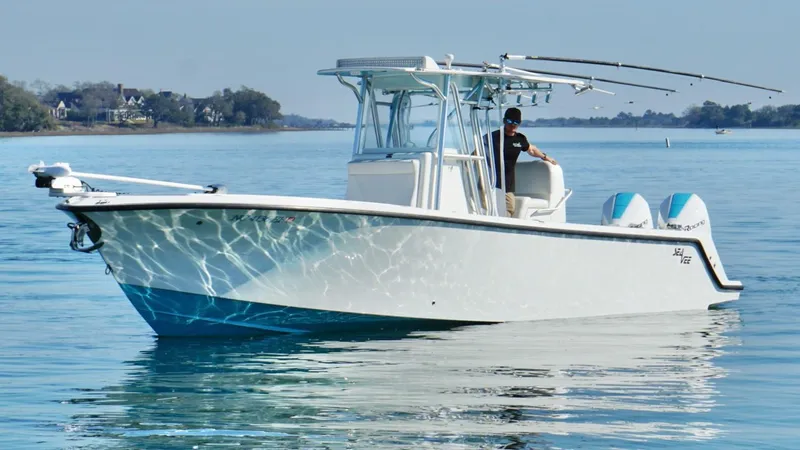 Yacht Photos Pics 2017 SeaVee 320B boat on calm water, featuring dual engines and sleek design.