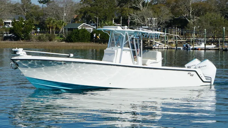  Yacht Photos Pics 2017 SeaVee 320B boat on calm water, featuring a sleek white design.