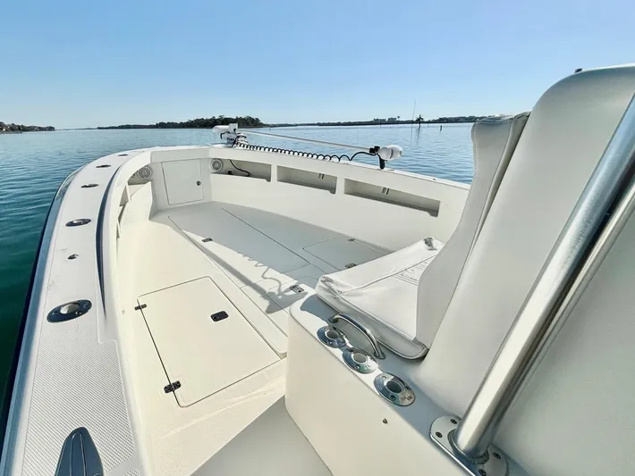  Yacht Photos Pics 2017 SeaVee 320B boat, spacious deck, calm waters, clear sky.