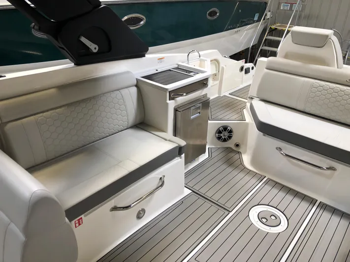  Yacht Photos Pics 2025 Sea Ray SDX 290 boat interior with sleek seating and modern amenities.