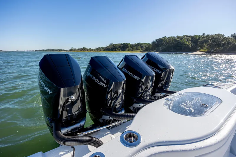  Yacht Photos Pics 2026 Yellowfin 39 Offshore boat with four Mercury outboard engines on a sunny day.