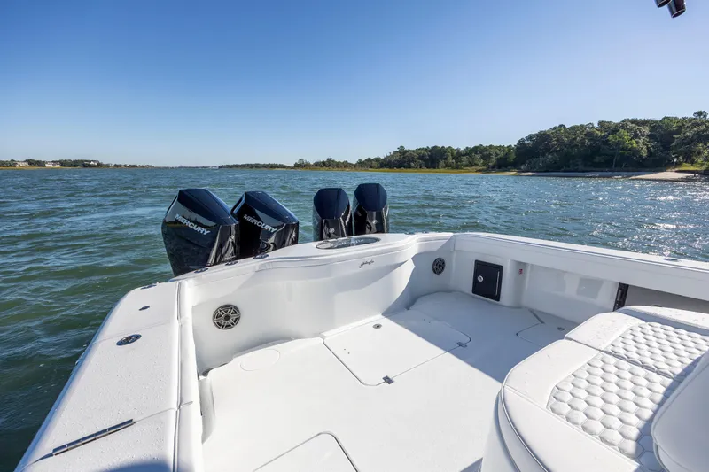  Yacht Photos Pics 2026 Yellowfin 39 Offshore boat with triple Mercury engines on open water.