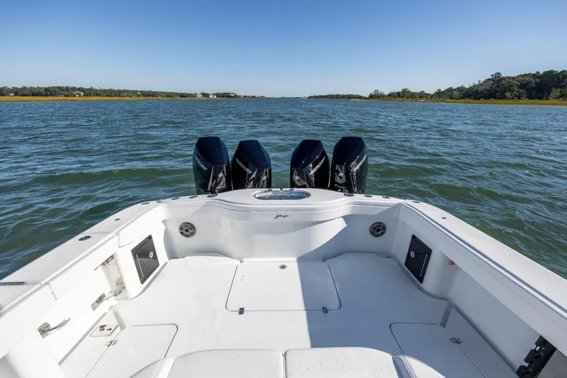 Yacht Photos Pics 2026 Yellowfin 39 Offshore boat with triple outboard engines on open water.