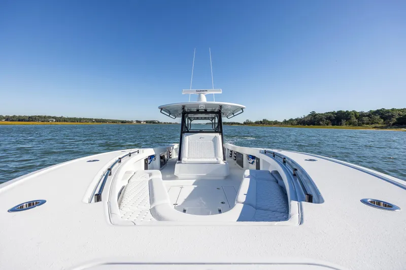  Yacht Photos Pics 2026 Yellowfin 39 Offshore boat on open water under clear blue sky.