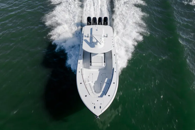  Yacht Photos Pics 2026 Yellowfin 39 Offshore boat cruising on open water, aerial view.