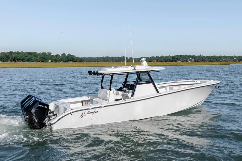  Yacht Photos Pics 2026 Yellowfin 39 Offshore boat cruising on open water.