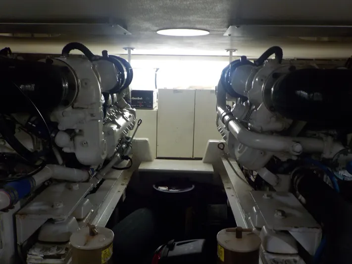 Tiramisu Yacht Photos Pics Engine room of 1996 Viking 47 Convertible yacht, showcasing dual engines.
