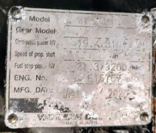 Bendigo Yacht Photos Pics Blurred engine specification plate with model and manufacturing details, including power and speed ratings.