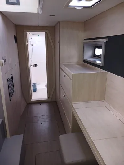 Bendigo Yacht Photos Pics Interior of 2021 Leopard 40 yacht with modern wood finish and compact design.