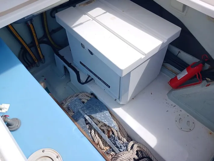 Bendigo Yacht Photos Pics Storage compartment in a 2021 Leopard 40 boat with ropes and equipment.