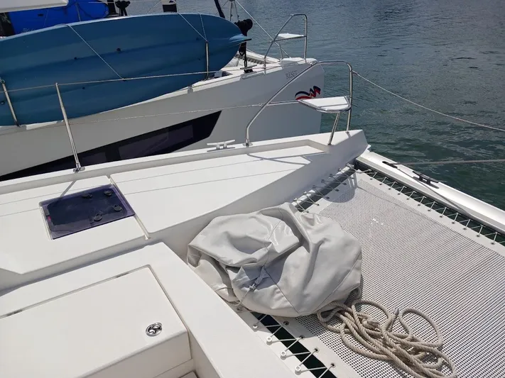 Bendigo Yacht Photos Pics Leopard 40 catamaran deck with ropes and netting, 2021 model, docked by the water.