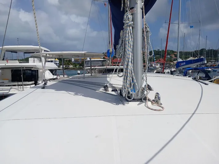 Bendigo Yacht Photos Pics Sailing catamaran Leopard 40, 2021 model, docked in a marina under cloudy skies.