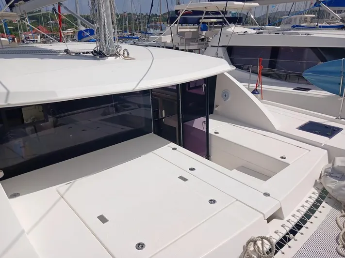 Bendigo Yacht Photos Pics 2021 Leopard 40 catamaran with spacious deck and modern design in a marina setting.
