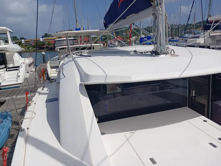 Bendigo Yacht Photos Pics 2021 Leopard 40 catamaran docked at marina, showcasing sleek design and spacious deck.