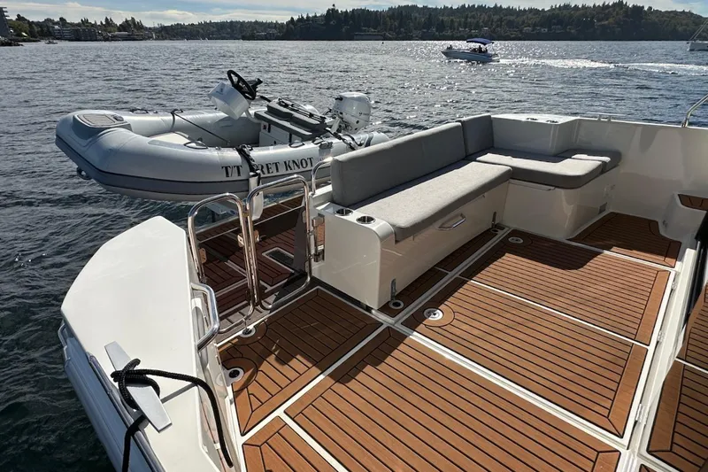 Fret Knot Yacht Photos Pics 2024 Beneteau Swift Trawler 41 Sedan with spacious deck and tender boat.