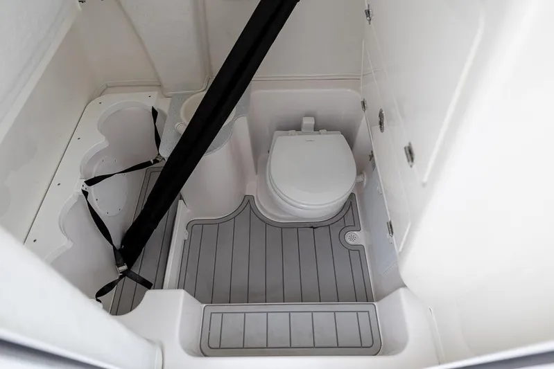  Yacht Photos Pics 2026 Sea Fox 268 Commander boat interior with toilet and storage compartments.