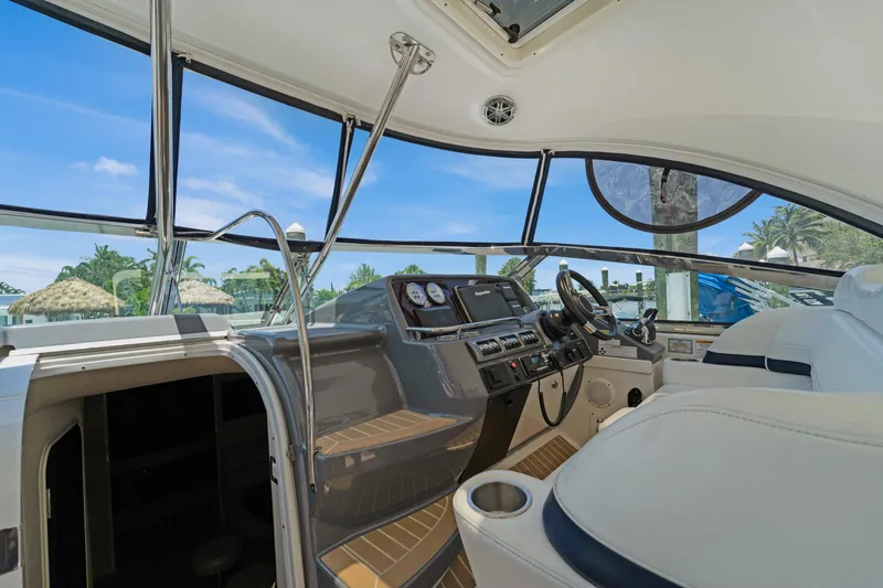 Dream Boat Yacht Photos Pics Interior cockpit of 2016 Formula 40 PC yacht with modern controls and panoramic windows.