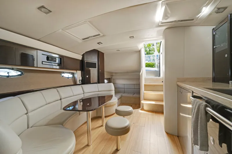 Dream Boat Yacht Photos Pics Interior of a 2016 Formula 40 PC yacht with modern seating and kitchen area.