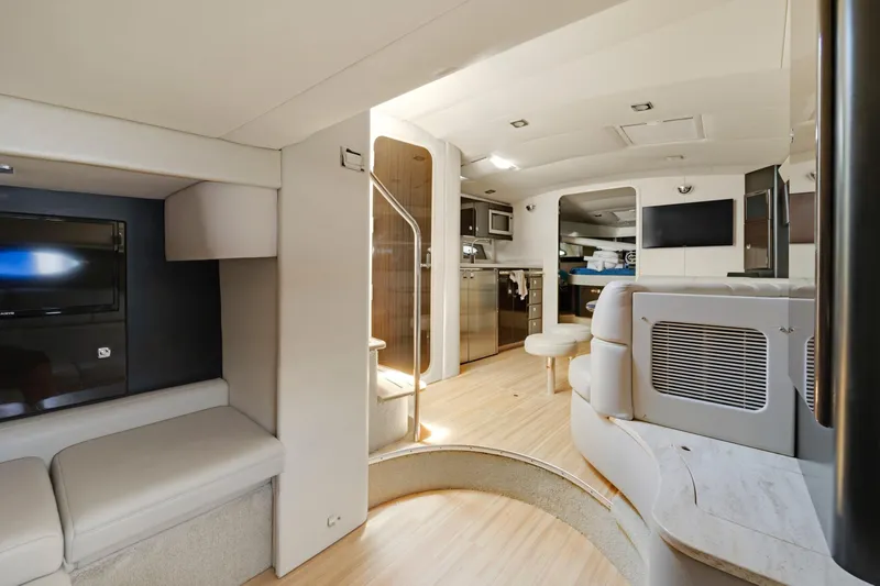 Dream Boat Yacht Photos Pics Luxurious interior of a 2016 Formula 40 PC yacht with modern furnishings and wood flooring.