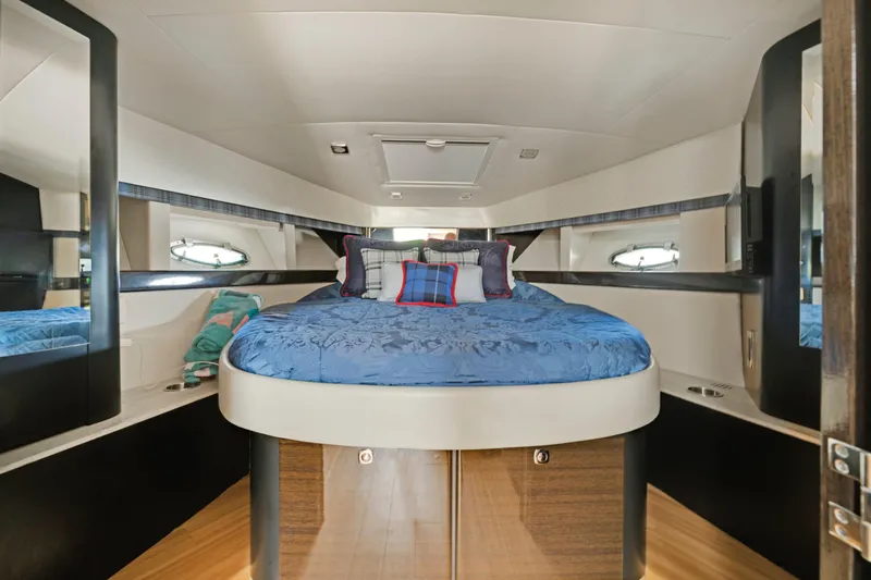 Dream Boat Yacht Photos Pics Luxurious bedroom interior of 2016 Formula 40 PC yacht with blue bedding.