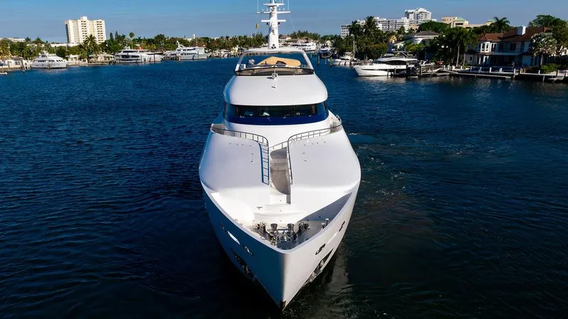 True North Yacht Photos Pics 2011 Hargrave Tri Deck yacht cruising in a scenic waterway.