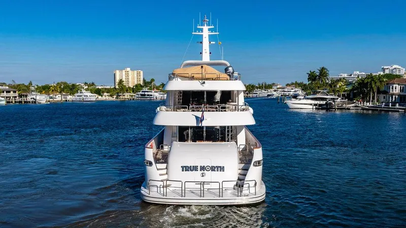 True North Yacht Photos Pics Luxury 2011 Hargrave Tri Deck yacht "True North" cruising in a scenic marina.