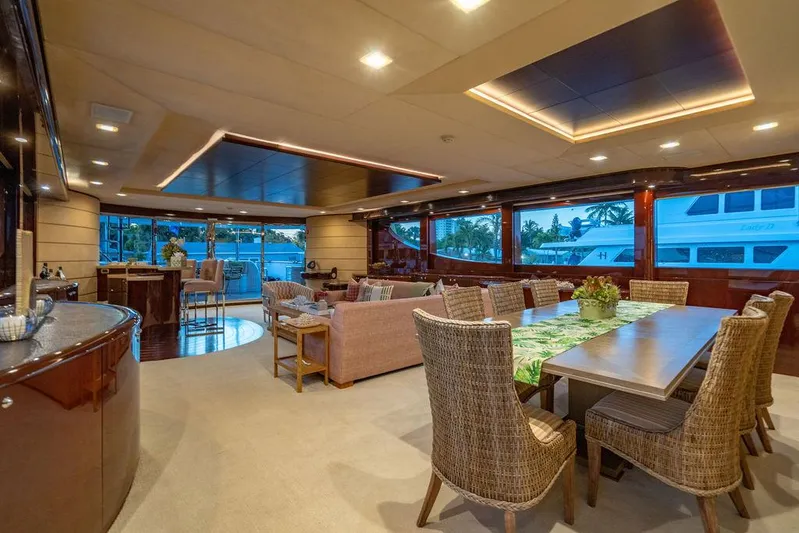 True North Yacht Photos Pics Luxurious interior of 2011 Hargrave Tri Deck yacht with elegant dining and seating areas.