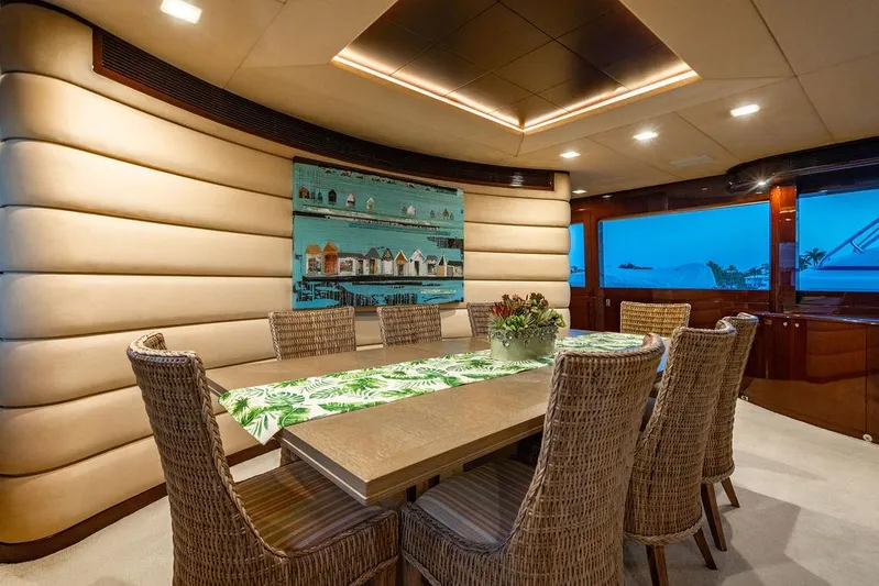 True North Yacht Photos Pics Luxurious dining area on 2011 Hargrave Tri Deck yacht with elegant decor and panoramic views.