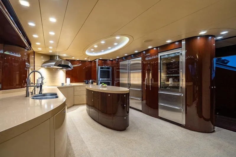 True North Yacht Photos Pics Luxurious kitchen interior of 2011 Hargrave Tri Deck yacht with modern appliances and elegant design.