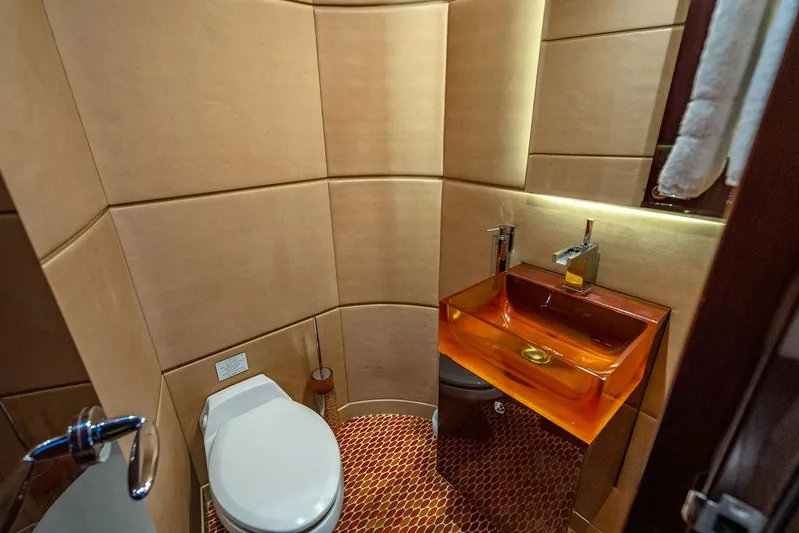 True North Yacht Photos Pics Luxurious bathroom on 2011 Hargrave Tri Deck yacht with modern fixtures and elegant design.