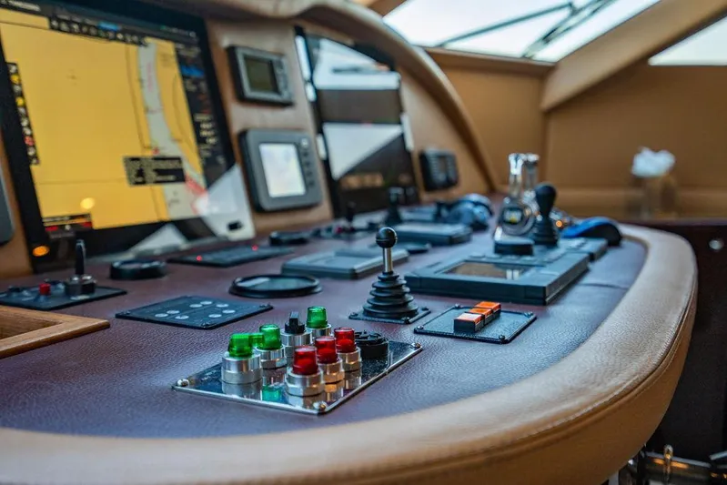 True North Yacht Photos Pics Control panel of a 2011 Hargrave Tri Deck yacht, featuring navigation and control systems.