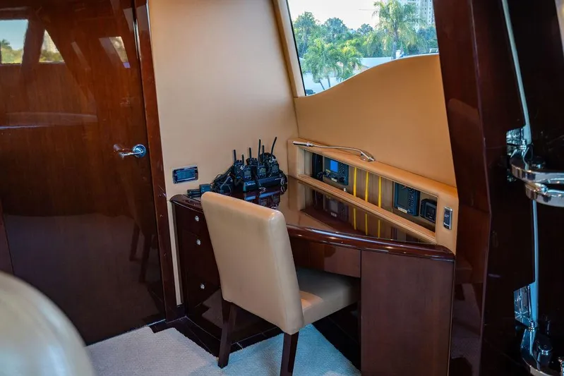 True North Yacht Photos Pics Luxurious interior of 2011 Hargrave Tri Deck yacht with communication equipment and elegant furnishings.