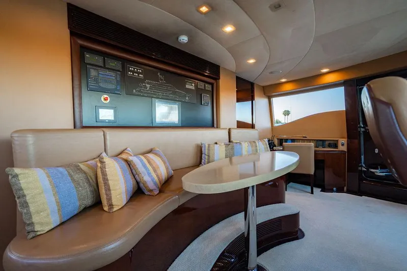 True North Yacht Photos Pics Luxurious interior of 2011 Hargrave Tri Deck yacht with plush seating and elegant design.