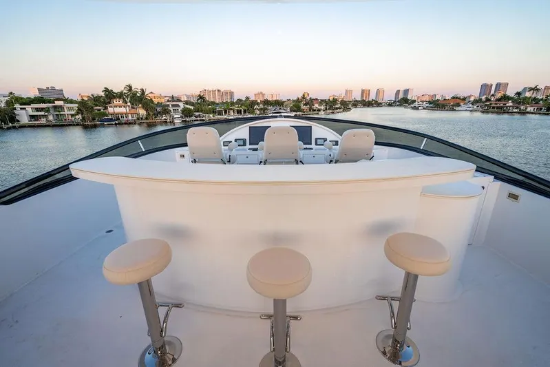 True North Yacht Photos Pics Luxurious 2011 Hargrave Tri Deck yacht with scenic waterfront view and elegant seating.