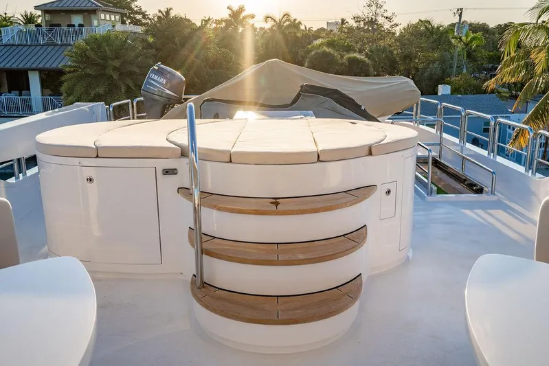 True North Yacht Photos Pics Luxurious 2011 Hargrave Tri Deck yacht with elegant outdoor seating and sunset view.