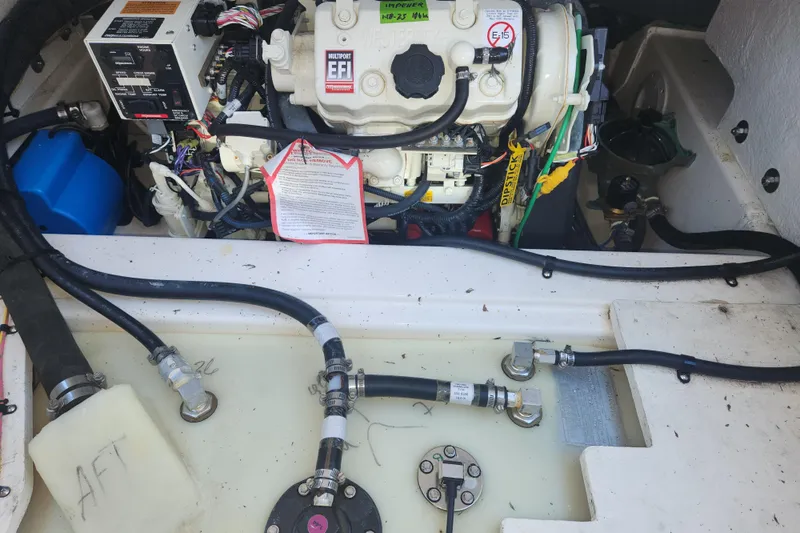  Yacht Photos Pics Engine compartment of 2021 Cutwater C-32 CB boat with visible wiring and components.