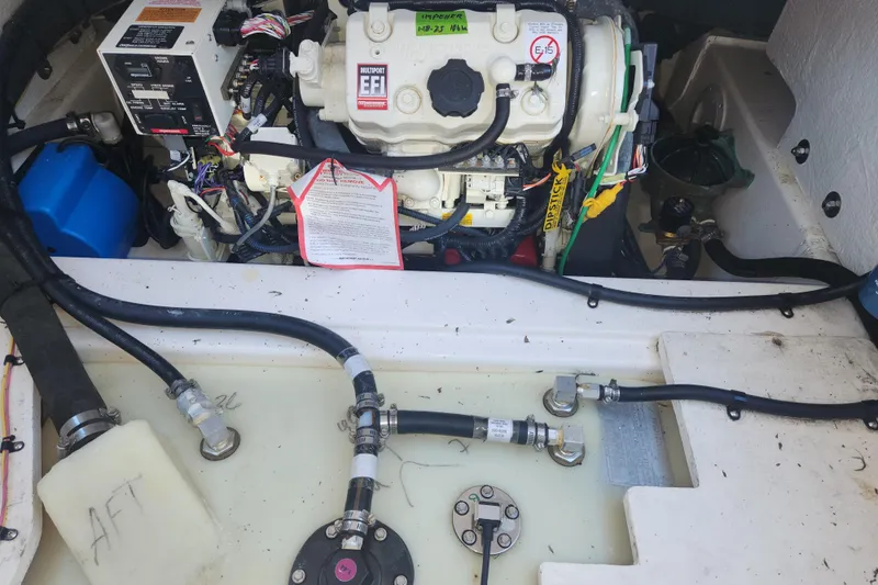  Yacht Photos Pics Engine compartment of a 2021 Cutwater C-32 CB boat, showcasing wiring and components.
