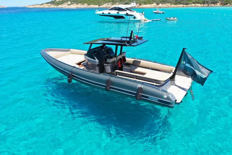 Black Shiver 100 Yacht Photos Pics Novamarine Black Shiver 100 Diesel 2025 in turquoise waters, showcasing sleek design and luxury.